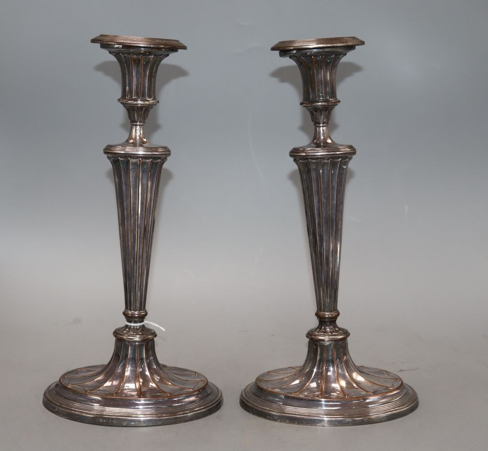 A pair of late 19th / early 20th century Old Sheffield plate candlesticks, height 31cm